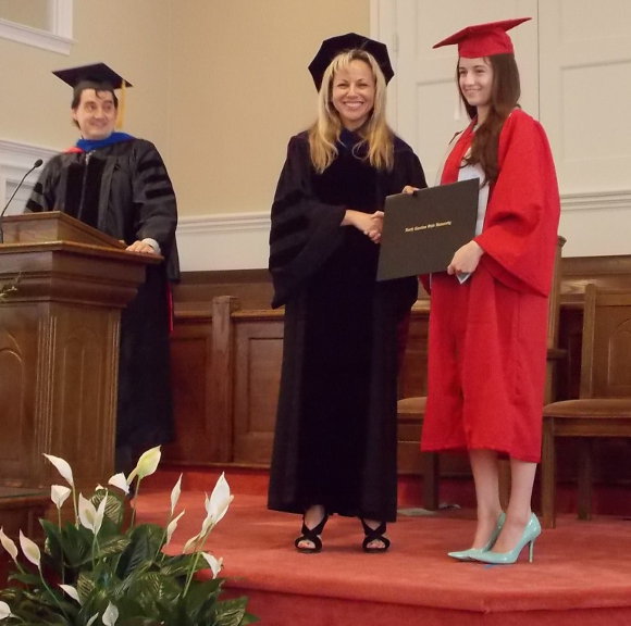 Kelly receives her diploma from NCSU 2014