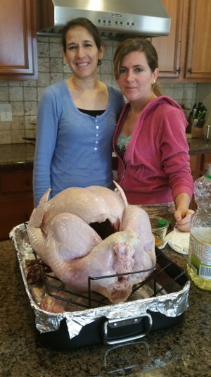 Lorena and Denise prepare the Thanksgiving Turkey 2014