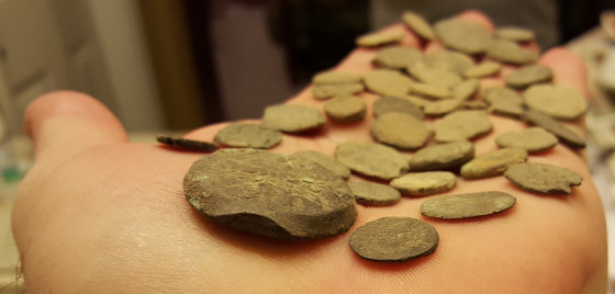 Ancient coins from the side